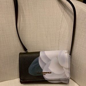 Karl Lagerfeld used black and white floral bag